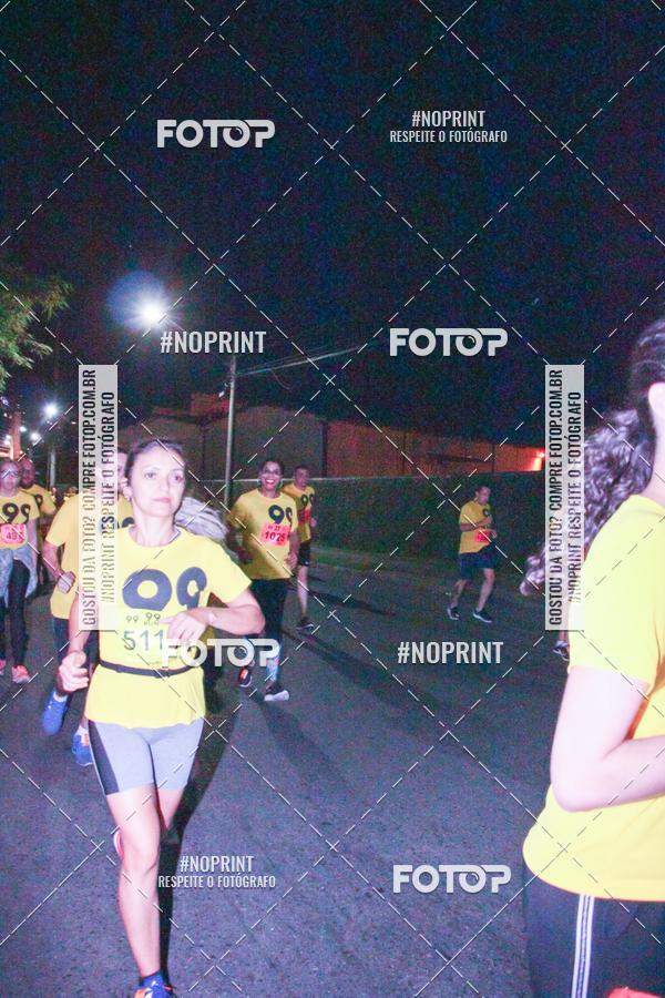 Compre suas fotos do evento99RUN no Fotop