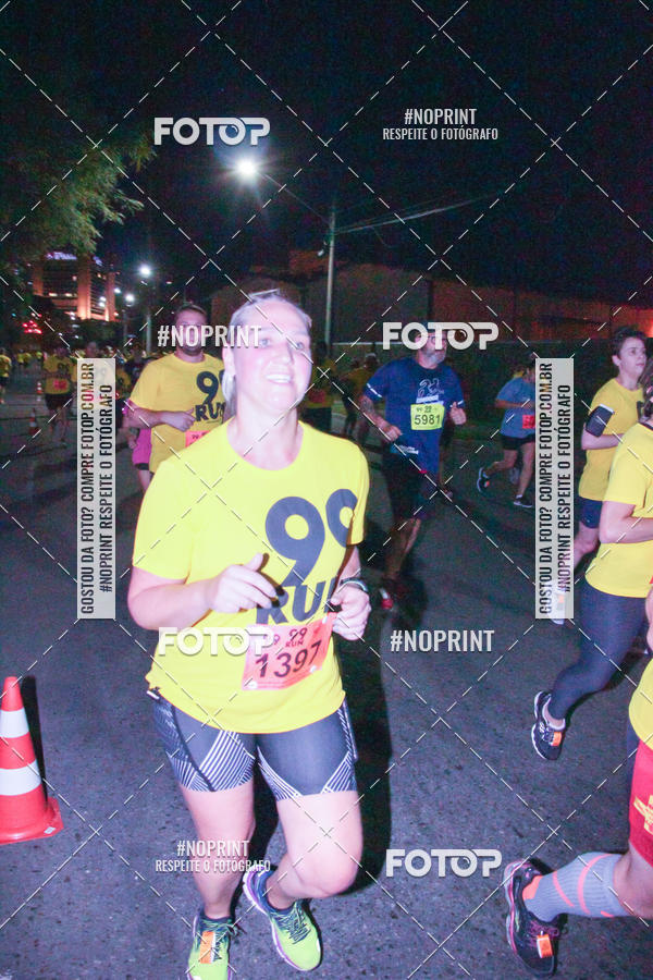Compre suas fotos do evento99RUN no Fotop