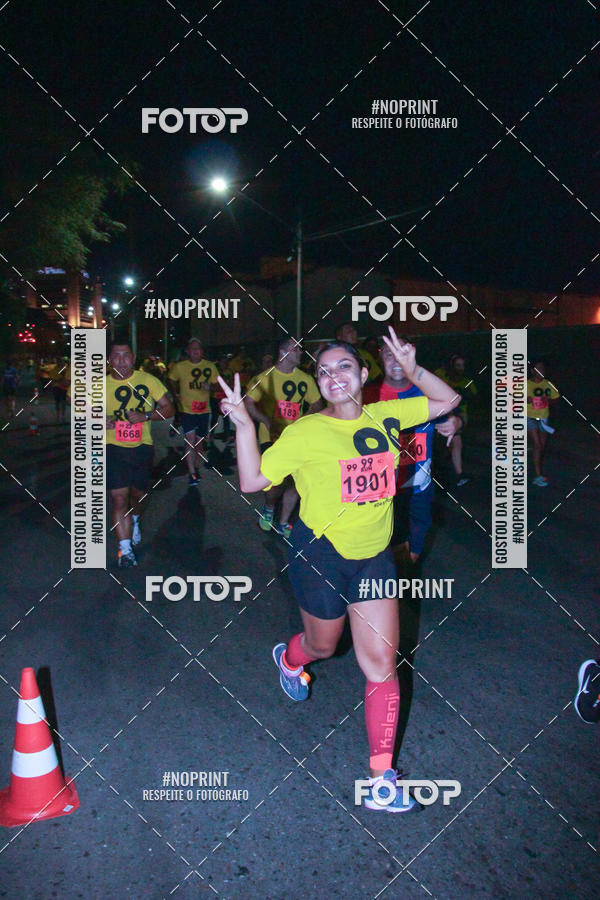 Compre suas fotos do evento99RUN no Fotop