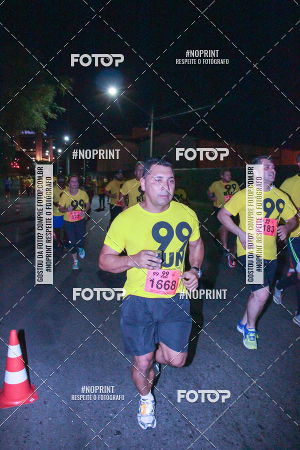 Compre suas fotos do evento99RUN no Fotop