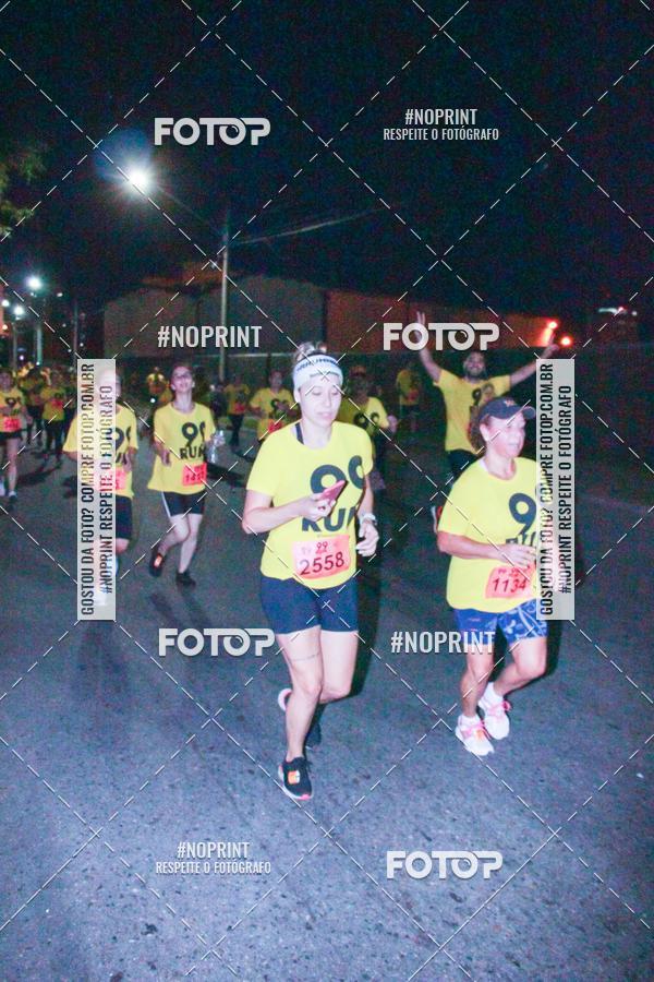 Compre suas fotos do evento99RUN no Fotop