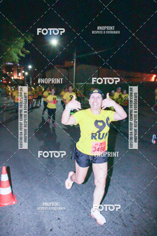 Compre suas fotos do evento99RUN no Fotop