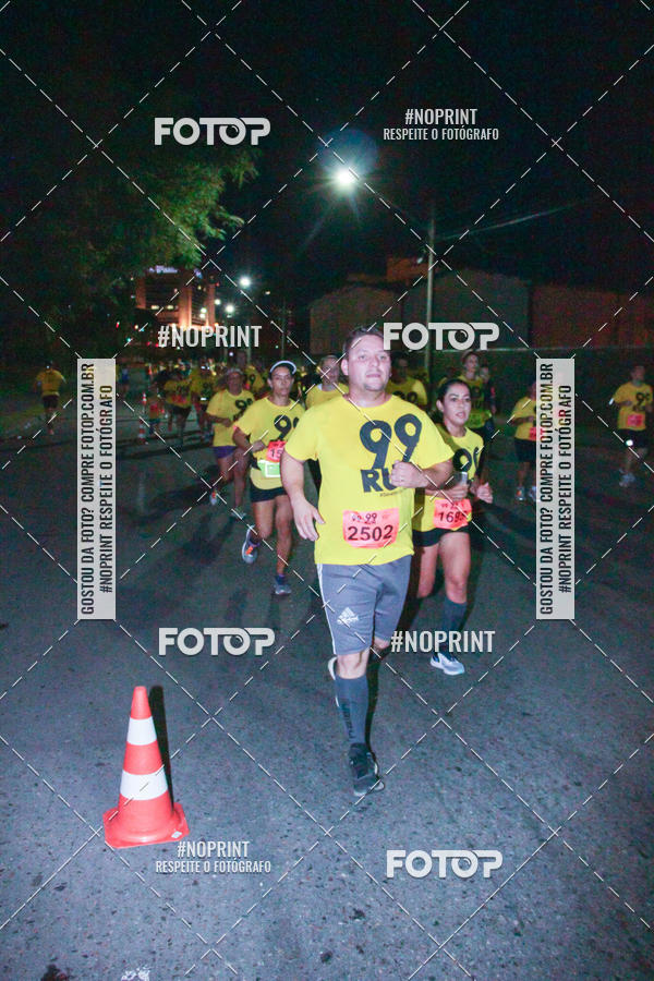 Compre suas fotos do evento99RUN no Fotop
