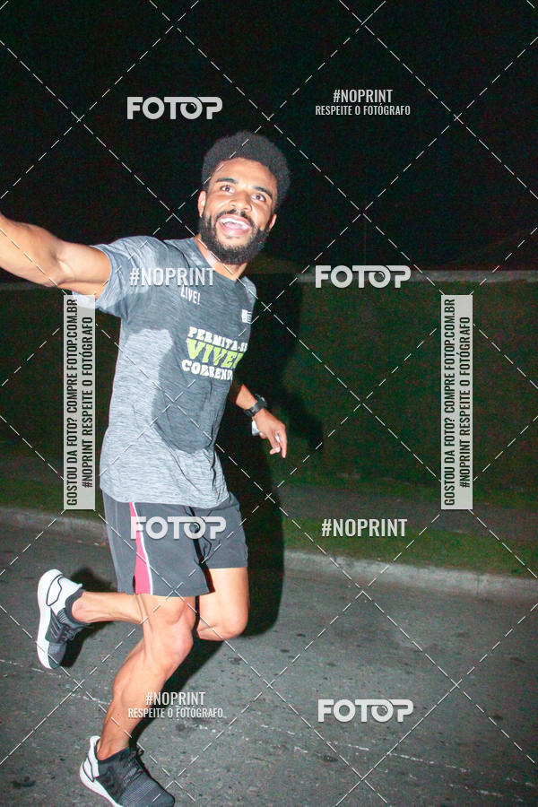 Compre suas fotos do evento99RUN no Fotop