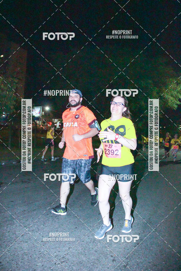 Compre suas fotos do evento99RUN no Fotop