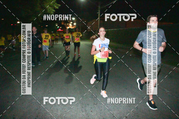 Compre suas fotos do evento99RUN no Fotop