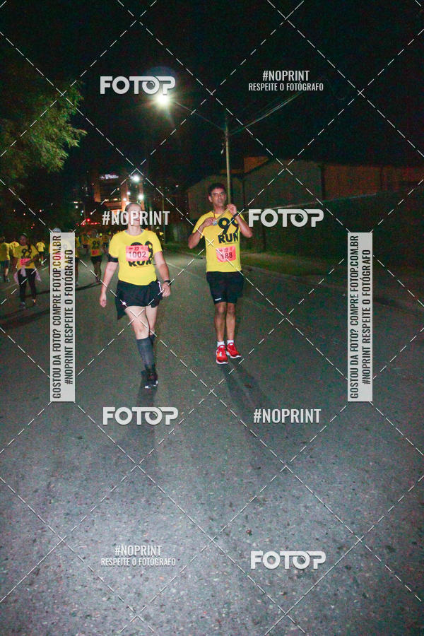 Compre suas fotos do evento99RUN no Fotop