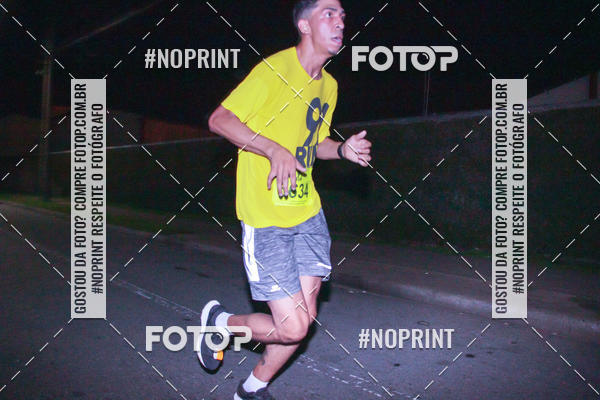 Compre suas fotos do evento99RUN no Fotop