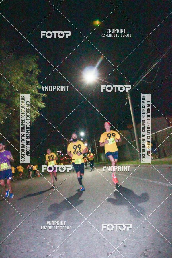Compre suas fotos do evento99RUN no Fotop