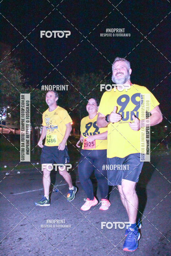 Compre suas fotos do evento99RUN no Fotop
