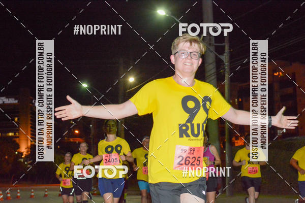 Compre as suas fotos do evento99RUN no Fotop