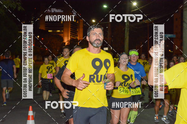 Compre as suas fotos do evento99RUN no Fotop