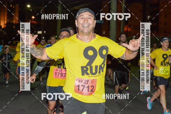Compre as suas fotos do evento99RUN no Fotop