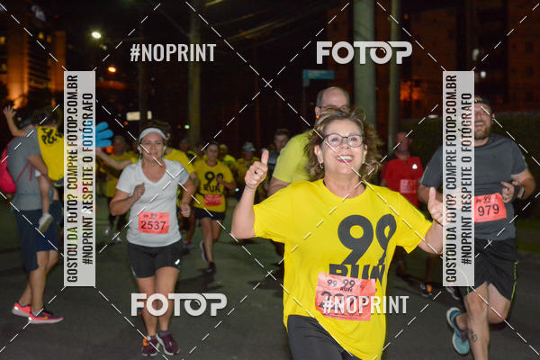 Compre as suas fotos do evento99RUN no Fotop