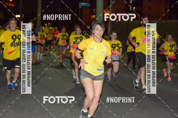 Compre suas fotos do evento99RUN no Fotop