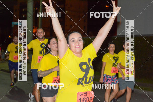 Compre suas fotos do evento99RUN no Fotop