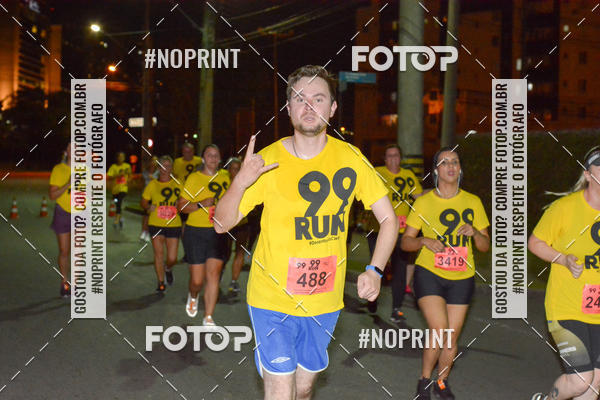 Compre suas fotos do evento99RUN no Fotop