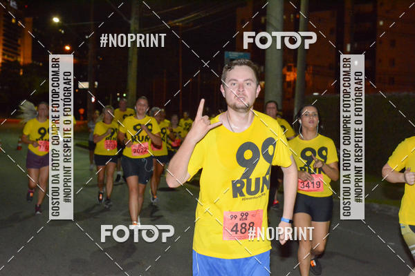 Compre suas fotos do evento99RUN no Fotop