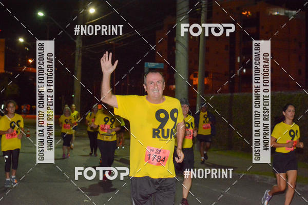 Compre suas fotos do evento99RUN no Fotop