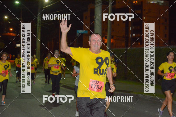 Compre suas fotos do evento99RUN no Fotop