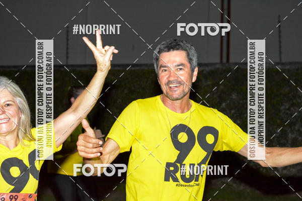 Compre suas fotos do evento99RUN no Fotop
