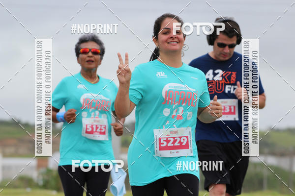 Buy your photos of the eventMEIA MARATONA DE JACARE  on Fotop