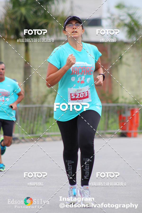 Buy your photos of the eventMEIA MARATONA DE JACARE  on Fotop
