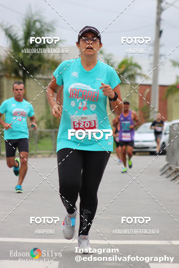 Buy your photos of the eventMEIA MARATONA DE JACARE  on Fotop