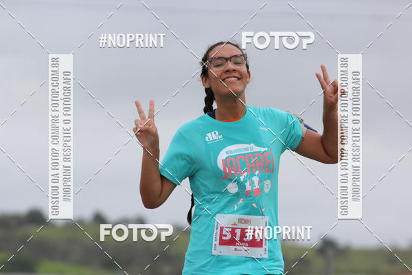 Buy your photos of the eventMEIA MARATONA DE JACARE  on Fotop