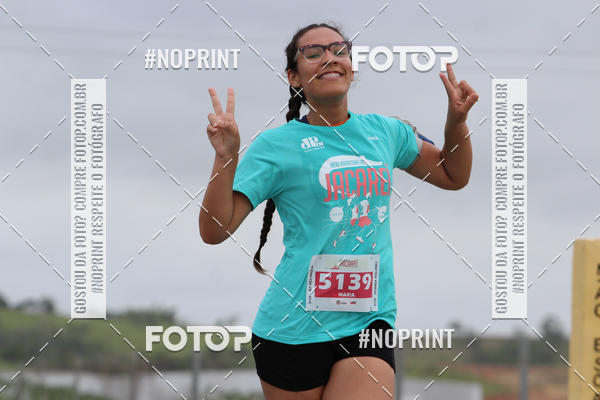 Buy your photos of the eventMEIA MARATONA DE JACARE  on Fotop