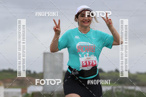 Buy your photos of the eventMEIA MARATONA DE JACARE  on Fotop