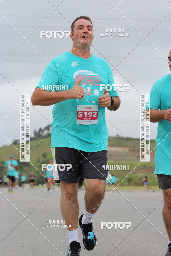 Buy your photos of the eventMEIA MARATONA DE JACARE  on Fotop