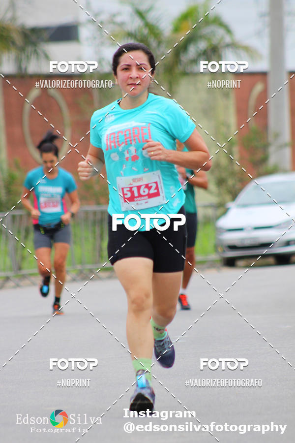 Buy your photos of the eventMEIA MARATONA DE JACARE  on Fotop
