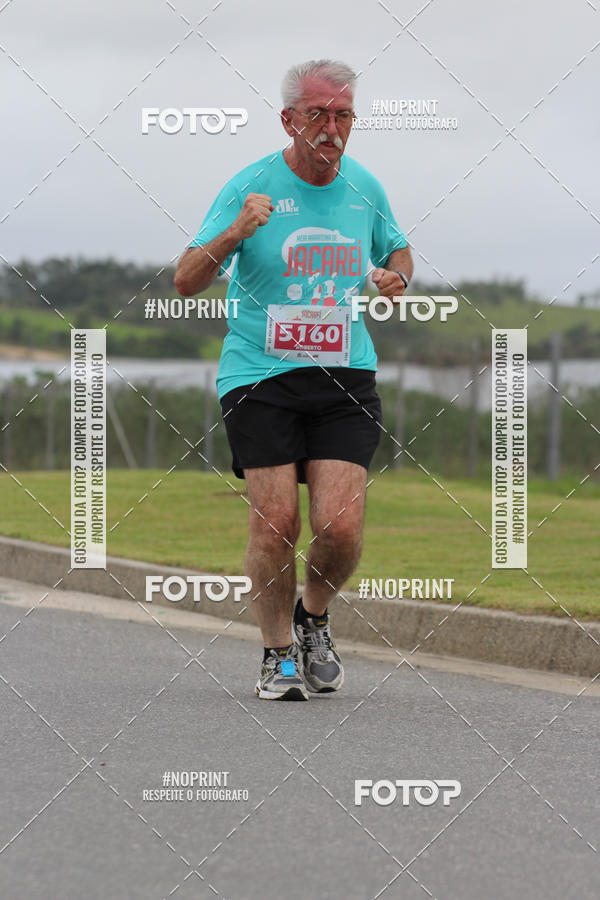 Buy your photos of the eventMEIA MARATONA DE JACARE  on Fotop