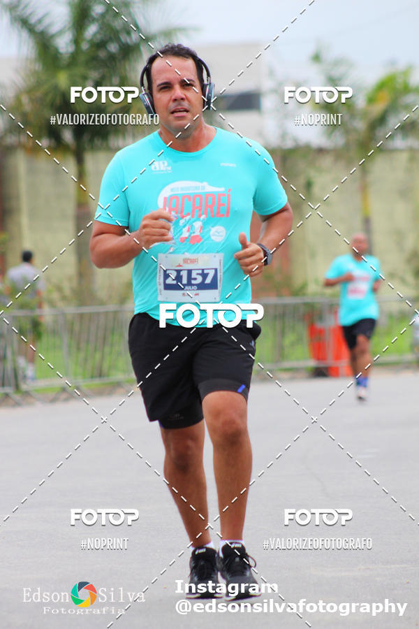 Buy your photos of the eventMEIA MARATONA DE JACARE  on Fotop