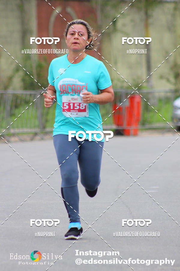 Buy your photos of the eventMEIA MARATONA DE JACARE  on Fotop