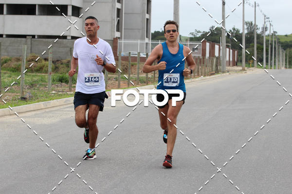 Buy your photos of the eventMEIA MARATONA DE JACARE  on Fotop