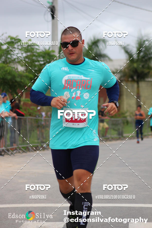 Buy your photos of the eventMEIA MARATONA DE JACARE  on Fotop