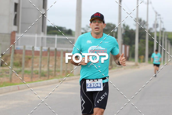 Buy your photos of the eventMEIA MARATONA DE JACARE  on Fotop