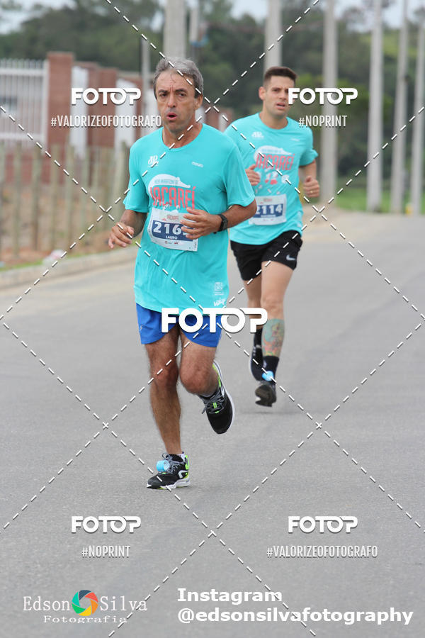 Buy your photos of the eventMEIA MARATONA DE JACARE  on Fotop