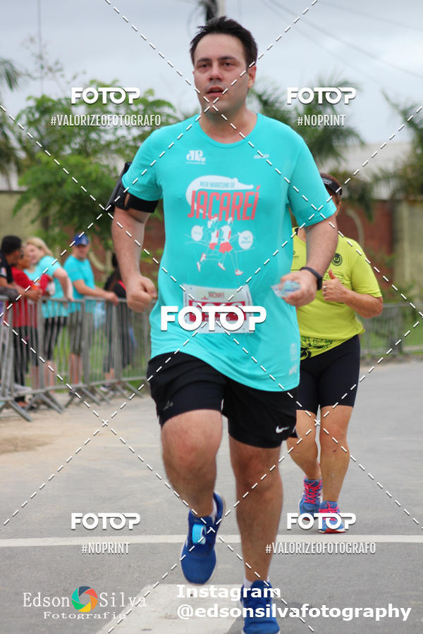 Buy your photos of the eventMEIA MARATONA DE JACARE  on Fotop