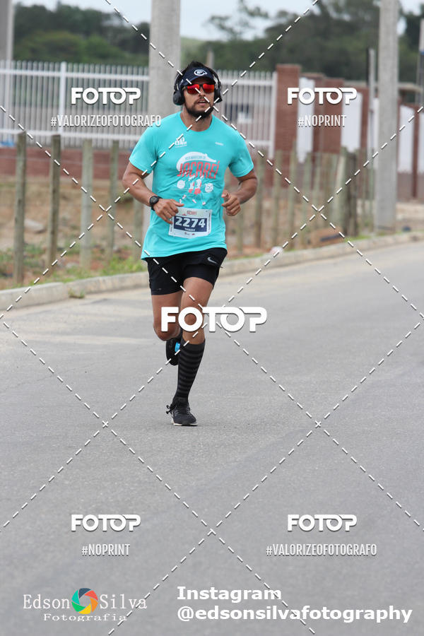Buy your photos of the eventMEIA MARATONA DE JACARE  on Fotop