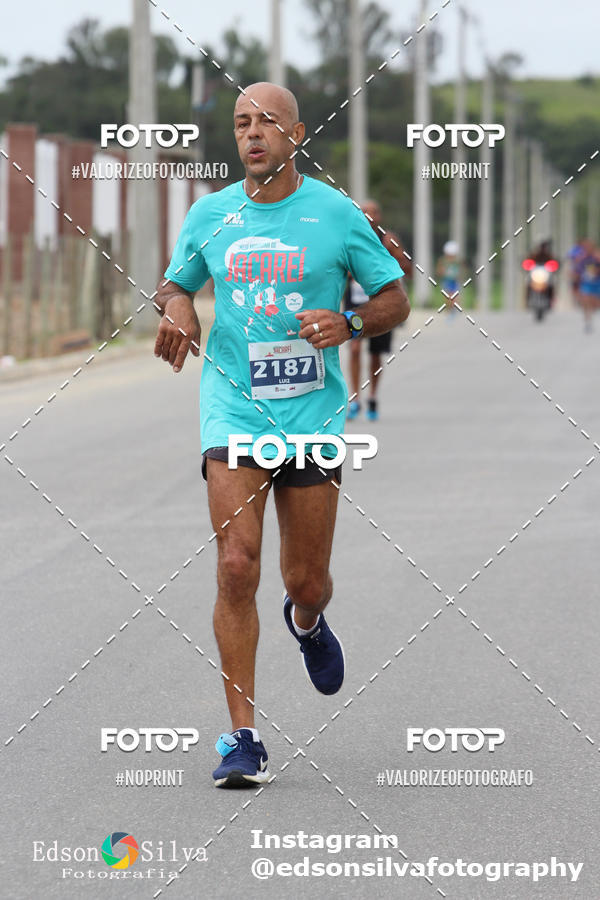 Buy your photos of the eventMEIA MARATONA DE JACARE  on Fotop