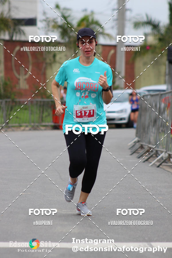 Buy your photos of the eventMEIA MARATONA DE JACARE  on Fotop