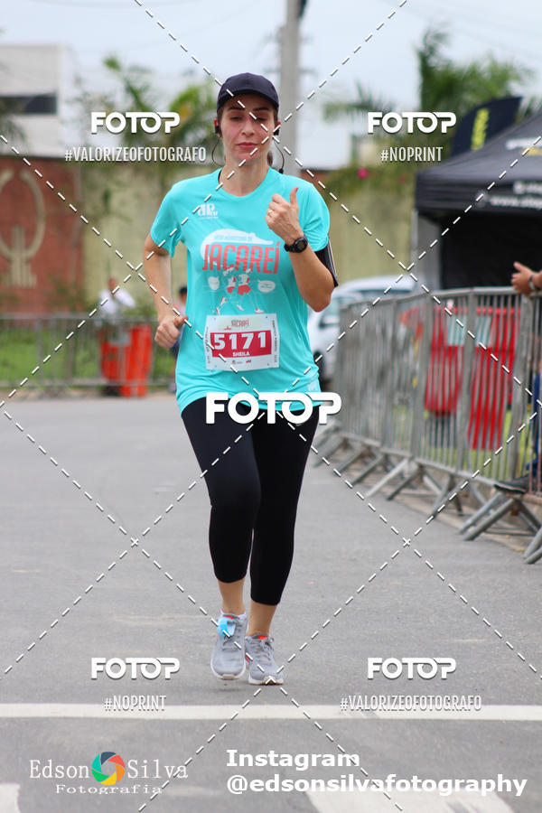 Buy your photos of the eventMEIA MARATONA DE JACARE  on Fotop