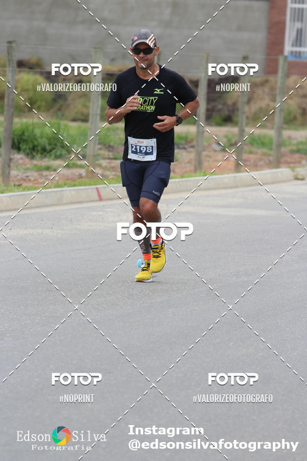 Buy your photos of the eventMEIA MARATONA DE JACARE  on Fotop