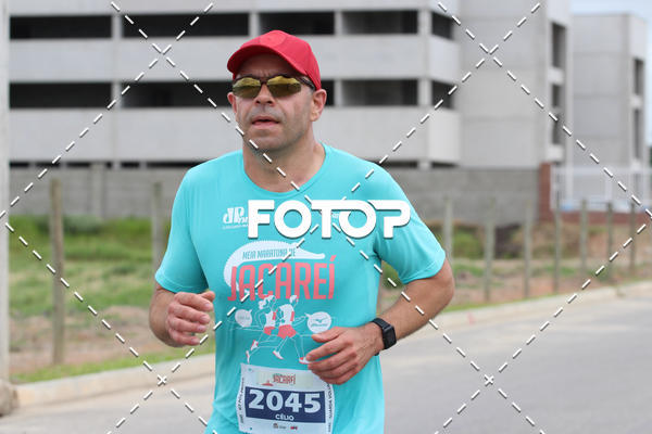 Buy your photos of the eventMEIA MARATONA DE JACARE  on Fotop