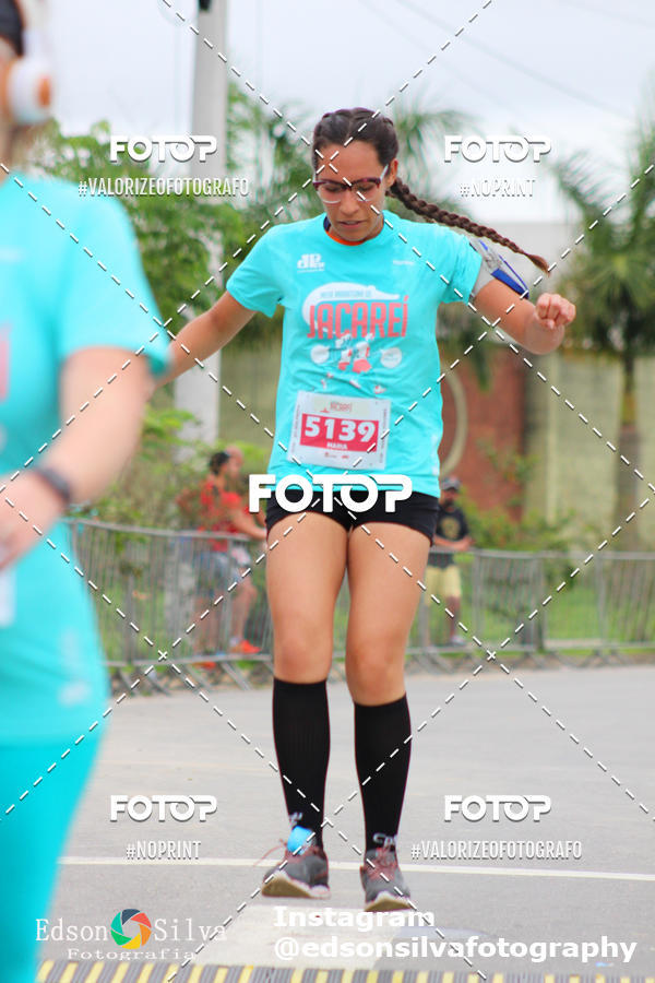 Buy your photos of the eventMEIA MARATONA DE JACARE  on Fotop