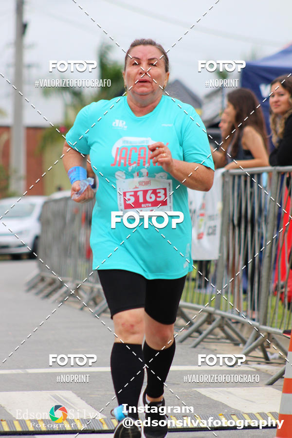 Buy your photos of the eventMEIA MARATONA DE JACARE  on Fotop