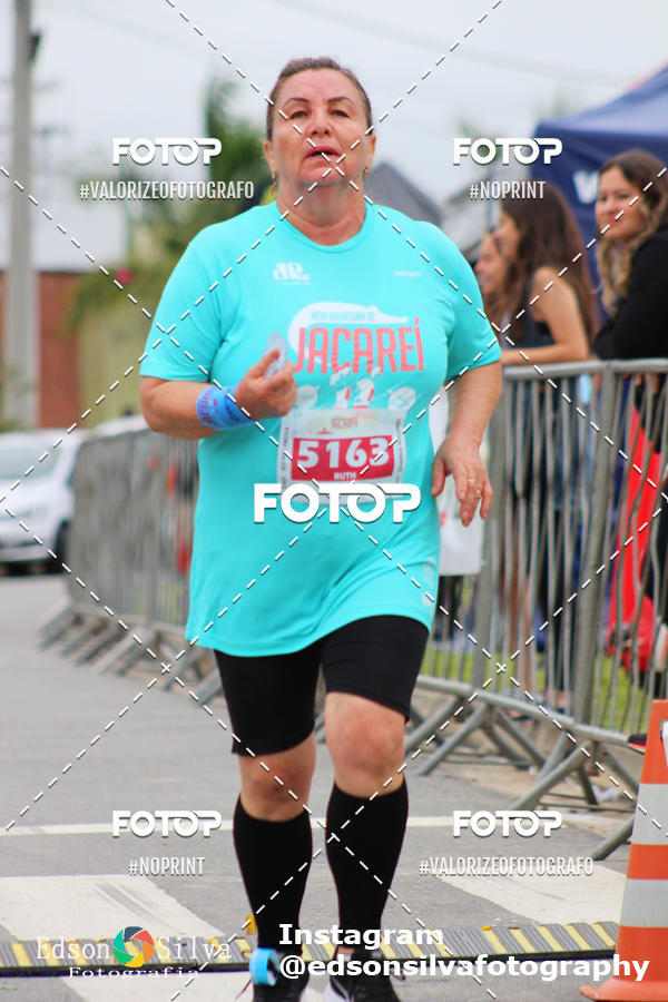 Buy your photos of the eventMEIA MARATONA DE JACARE  on Fotop